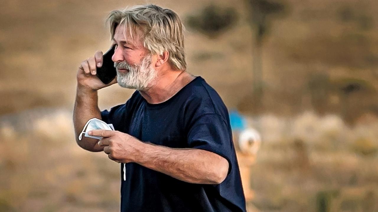 A distraught Baldwin lingered in the parking lot outside the Santa Fe County Sheriff's offices after being questioned on October 20. Picture: Jim Weber/Santa Fe New Mexican