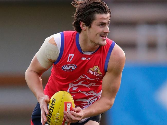 MELBOURNE, AUSTRALIA - JULY 26: Tom Boyd of the Bulldogs runs with the ball during a Western Bulldogs AFL training session at Whitten Oval on July 26, 2016 in Melbourne, Australia. (Photo by Darrian Traynor/Getty Images)