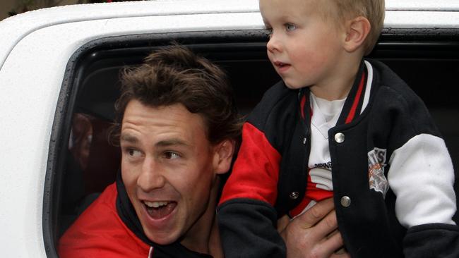 Justin Koschitzke and godson Zach in the 2009 parade. Picture: HWT Library.