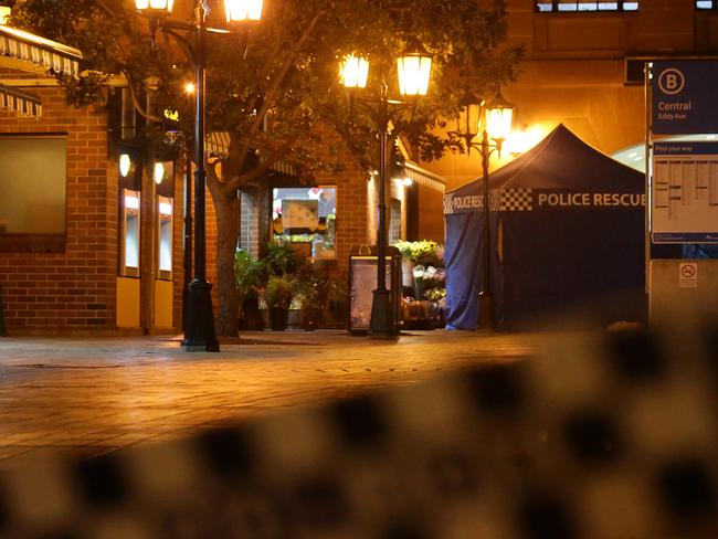 Police continue to investigate the shooting of a man by Police at Central Station. A tent still blocks the view to the florist where the shooting took place. Police were also seen speaking to an elderly male and another male near the scene who may have been witnesses. Pics Bill Hearne