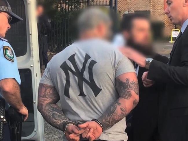 A senior Finks figure is arrested in North Wollongong in February this year by the Criminal Groups Squad.