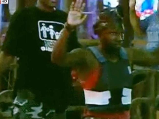 This man was also pictured at the rally wearing a bulletproof vest. Picture: Sky News.