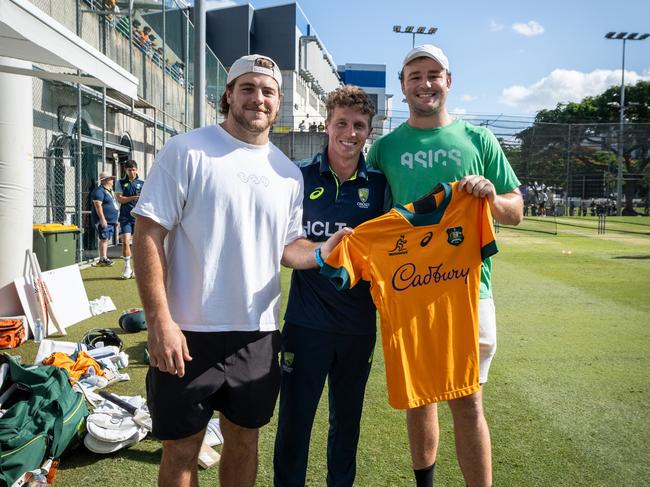 Queensland Reds and Wallabies players Fraser McReight and Harry Wilson with Australian batsman Nathan McSweeney Picture Queensland Reds