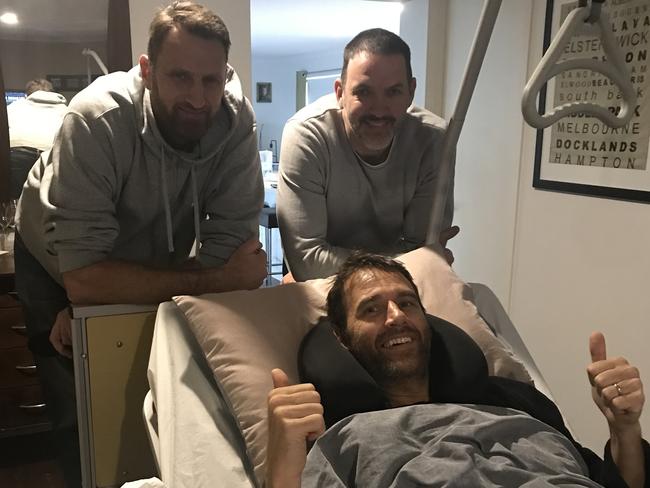 Andrew Parkinson recovering at home with fellow Magic men Chris Anstey and Sam Mackinnon.