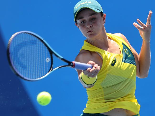 TOKYO, JAPAN - JULY 25: Ashleigh Barty of Team Australia plays a forehand during her Women's Singles First Round match against Sara Sorribes Tormo of Team Spain on day two of the Tokyo 2020 Olympic Games at Ariake Tennis Park on July 25, 2021 in Tokyo, Japan. (Photo by Clive Brunskill/Getty Images)