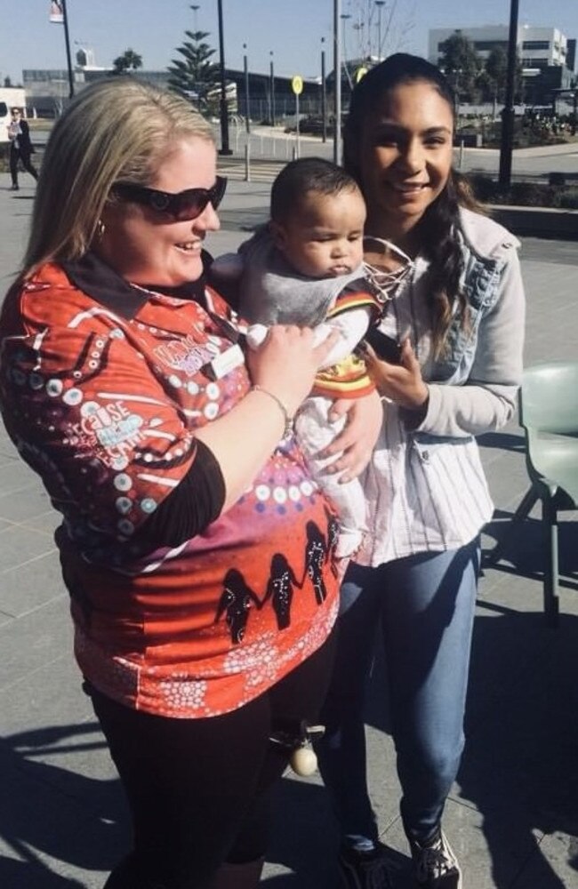 Samantha Alexander with western Sydney pro boxer Shanelle Dargan and Dargan's son Oryn at a NAIDOC event. Picture: Supplied