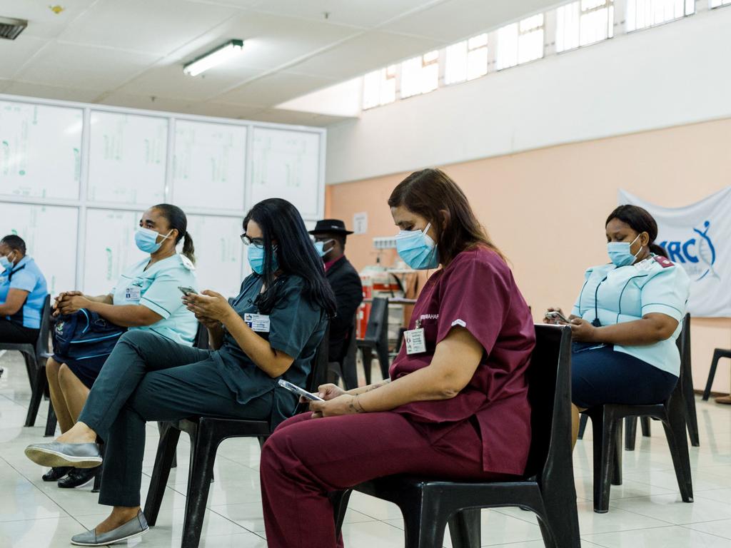 Healthcare workers await to receive a dose of the Johnson &amp; Johnson vaccine in South Africa. Picture: AFP