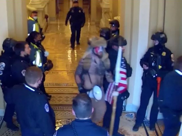 Jacob Chansley is surrounded by police on January 6, 2021. Picture: Supplied