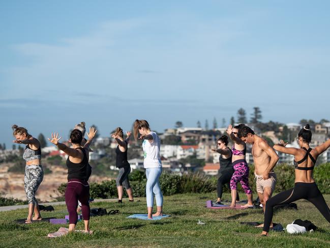 A group doing yoga near Bondi Beach. Picture: AAP