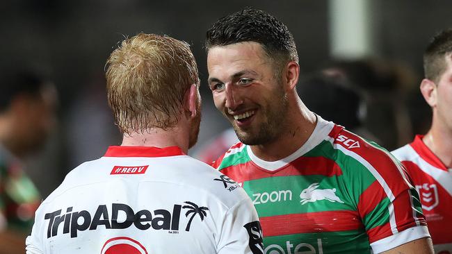 Sam Burgess with James Graham at full time. Picture: Phil Hillyard