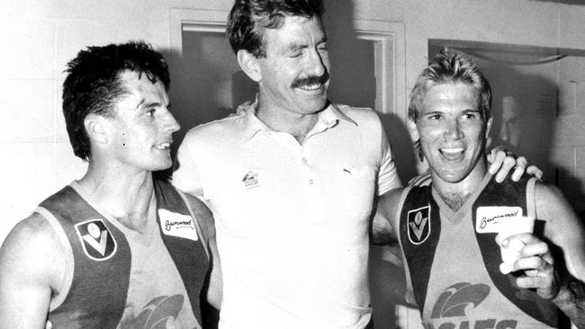 West Coast Eagles’ inaugural coach Ron Alexander (centre) with John Annear and Chris Mainwaring celebrate a win against Hawthorn.