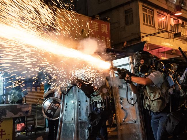 Police fire tear gas to clear pro-Democracy protesters during a demonstration on Hungry Ghost Festival day in the Sham Shui Po district on August 14. Picture: Getty