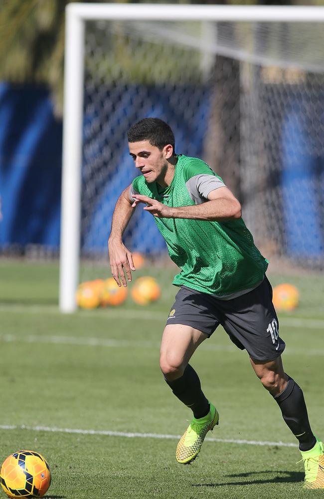 Tom Rogic competes for the ball during an Australian Socceroos training session at Central Coast Stadium.