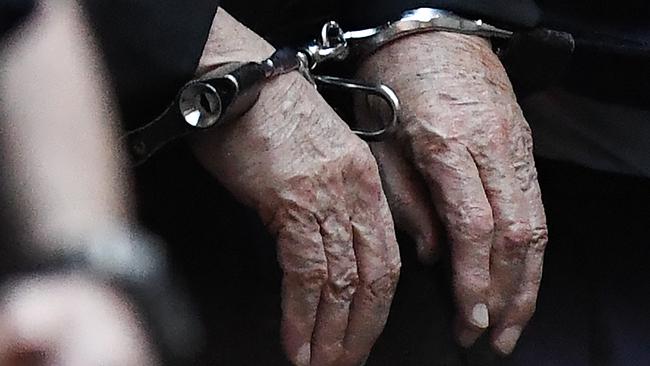 The hands of Cardinal George Pell as he leaves the Supreme Court of Victoria in Melbourne, Thursday, June 6, 2019. Pell is appealing his conviction for sexually abusing two boys in the 1990s. (AAP Image/Erik Anderson) NO ARCHIVING