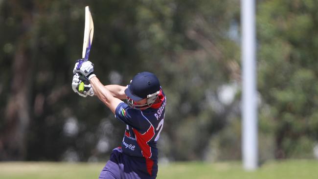 Sweeney launches a ball in his Dandenong days.