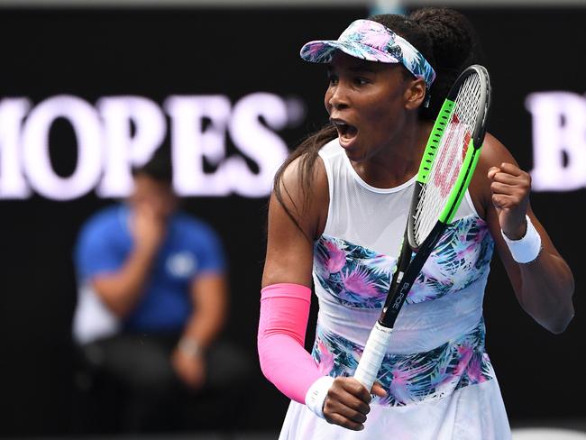 Venus Williams of the US reacts after a point against Romania's Mihaela Buzarnescu during their women's singles match on day two of the Australian Open tennis tournament in Melbourne on January 15, 2019. (Photo by WILLIAM WEST / AFP) / -- IMAGE RESTRICTED TO EDITORIAL USE - STRICTLY NO COMMERCIAL USE --