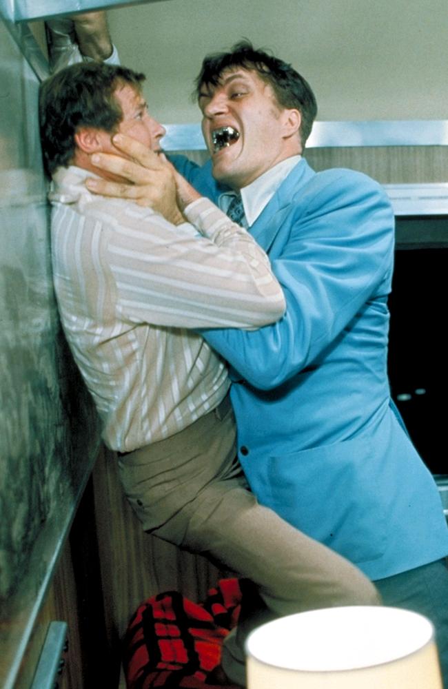 Roger Moore as James Bond with Richard Kiel as Jaws in The Spy Who Loved Me.