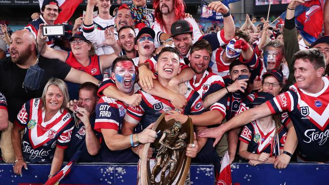 Victor Radley celebrates with the NRL premiership trophy after the Sydney Roosters won last year’s grand final. Picture: Getty Images