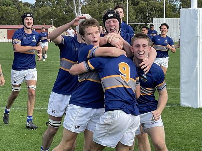 Churchie celebrate Archie Wilson's second try.