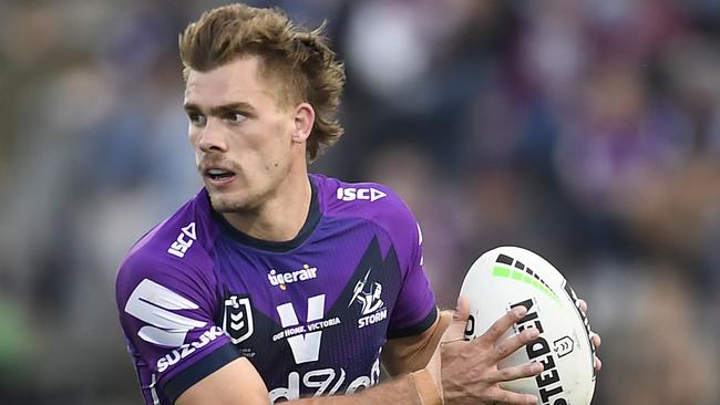 SUNSHINE COAST, AUSTRALIA - AUGUST 30: Ryan Papenhuyzen of the Storm runs the ball during the round 16 NRL match between the Melbourne Storm and the Manly Sea Eagles at Sunshine Coast Stadium on August 30, 2020 in Sunshine Coast, Australia. (Photo by Ian Hitchcock/Getty Images)