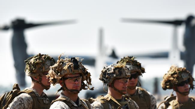 Marines with Marine Rotational Force Darwin 18 prepare to board an MV-22 Osprey tilt-rotor aircraft at Royal Australian Air Force Base Darwin July 24, 2018. The Marines were heading to Mount Bundy to take part in field training. PHOTO: U.S. Marine Corps Staff Sgt Daniel Wetzel