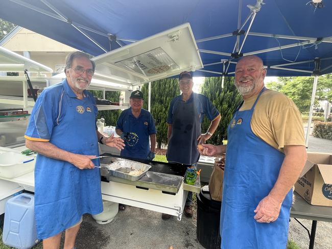 Adrian Pitman, Mel Harris, Geoff Buchanan and Mark Powell volunteering at the Australia Day breakfast in Maryborough.