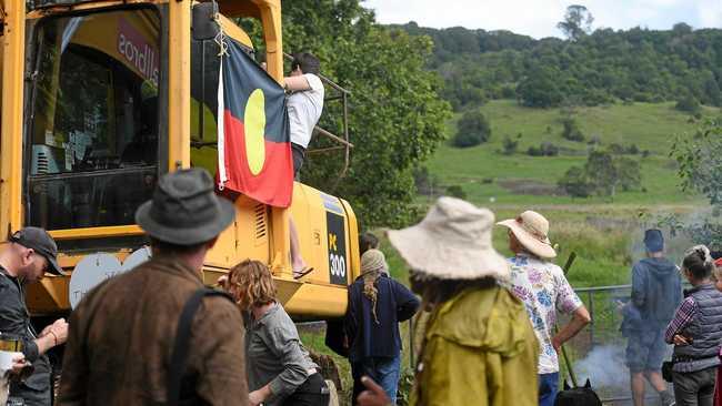 Community supporters and protesters at the site after performing a sacred fire and smoking ceremony to protest the controversial North Lismore Plateau development. Picture: Marc Stapelberg