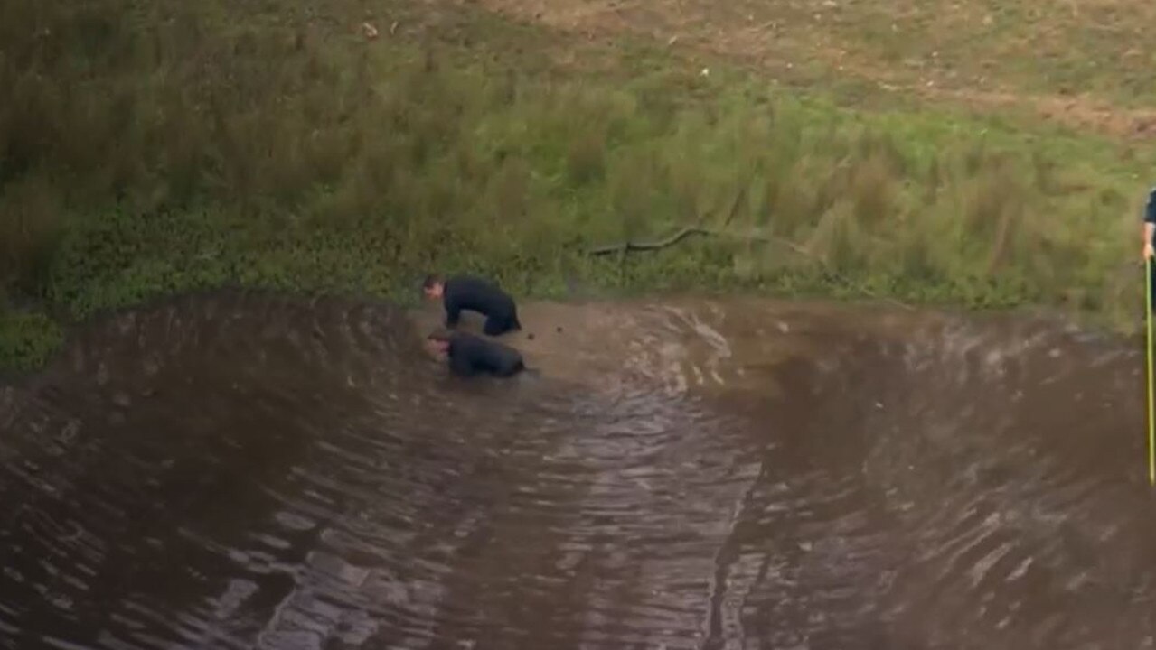 Police searching a dam on Mr Cella’s property on Monday morning. Picture: ABC News