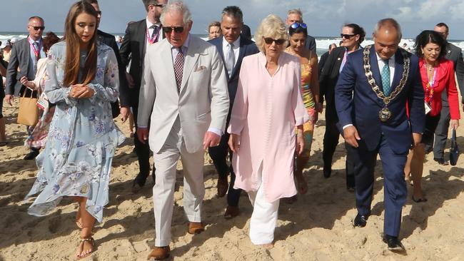 Prince Charles and Camilla hit the beach during their visit for the Commonwealth Games. Picture: Glenn Hampson