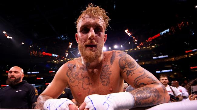 TAMPA, FLORIDA – DECEMBER 18: Jake Paul reacts to knocking out Tyron Woddley in the sixth round during a fight on December 18, 2021 in Tampa, Florida. (Photo by Mike Ehrmann/Getty Images)