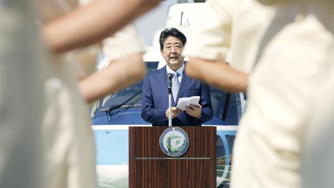 Japanese Prime Minister Shinzo Abe is seen addressing the sailors during a ship tour of the Japan Coast Guard vessel PLH08 Echigo at Fort Hill Wharf in Darwin, Northern Territory, Australia, Saturday, November 17, 2018. Mr Abe is in Darwin with wife Akie visiting Australia on an official two day visit to discuss bilateral and international issues with Australian officials. (AAP Image/Michael Franchi) NO ARCHIVING