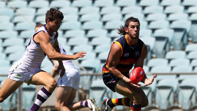 Crows player Taylor Walker enjoying his own mullet run back in the day.