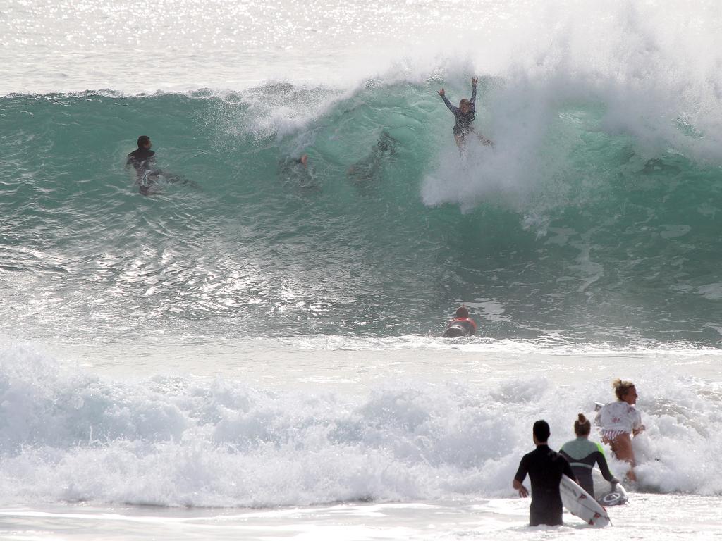 Surfers pictured enjoying good swell and near perfect waves at Snapper Rocks. Picture: Mike Batterham