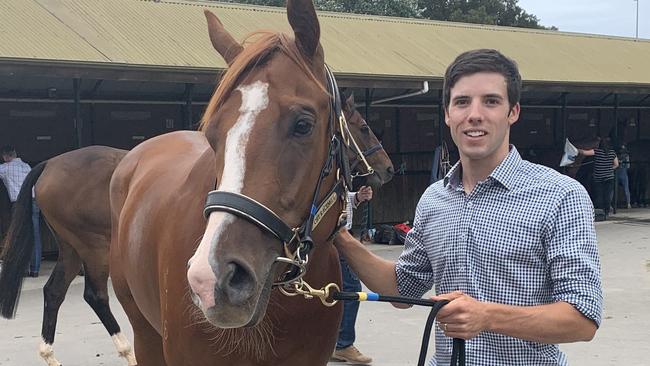 Tasmanian trainer Cameron Thompson with one of his horses heading to Victoria.