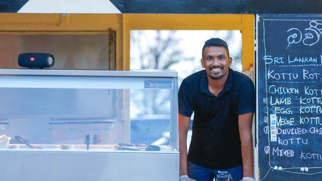 Vendor Pasindu Sandanayake on the Nightcliff foreshore as the City of Darwin brings out a food van locator. Picture: GLENN CAMPBELL