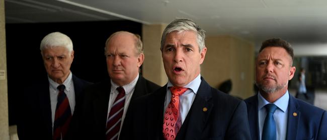 BRISBANE, AUSTRALIA – NewsWire Photos – MARCH 15, 2023. KAP Queensland leader Robbie Katter (2nd right), joined by (L to R) Federal Member for Kennedy Bob Katter, Shane Knuth and Nick Dametto, speaks to the media at Parliament House. Picture: Dan Peled / NCA NewsWire