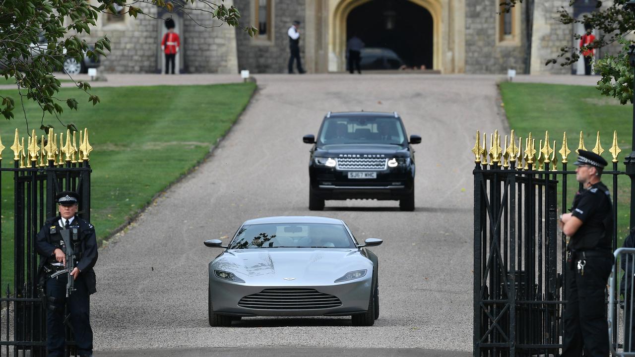 Prince Andrew’s younger daughter Princess Eugenie and Jack Brooksbank leave Windsor Castle in an Aston Martin DB10 after their wedding in October 2018. Picture: Getty