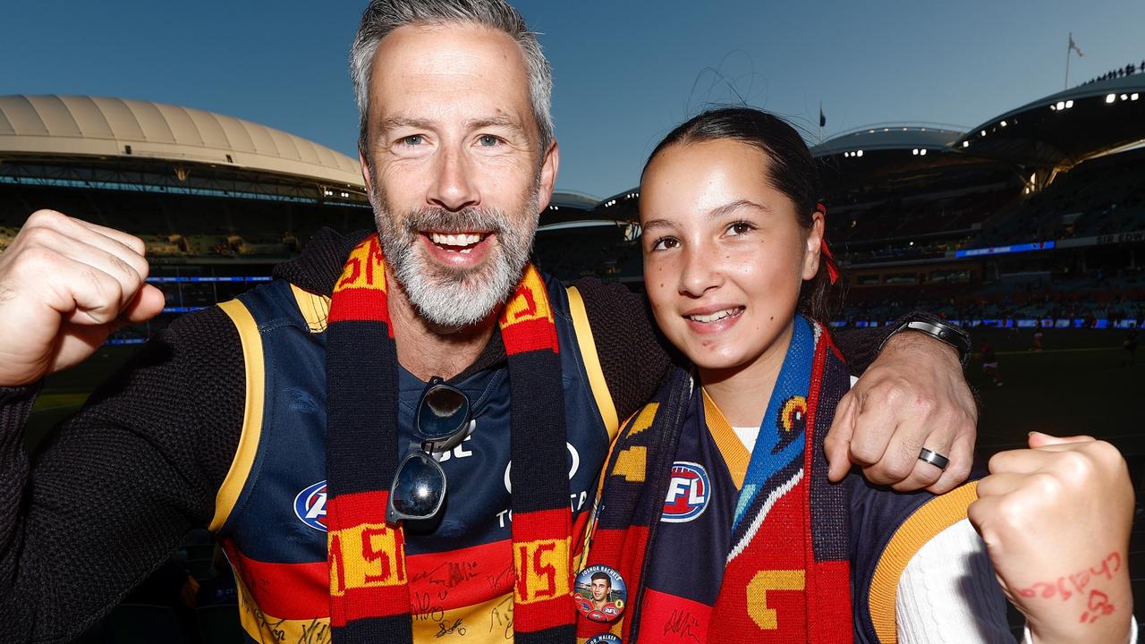 ADELAIDE, AUSTRALIA - APRIL 04: Crows fans pose during the 2024 AFL Round 04 match between the Adelaide Crows and the Melbourne Demons at Adelaide Oval on April 04, 2024 in Adelaide, Australia. (Photo by Michael Willson/AFL Photos via Getty Images)