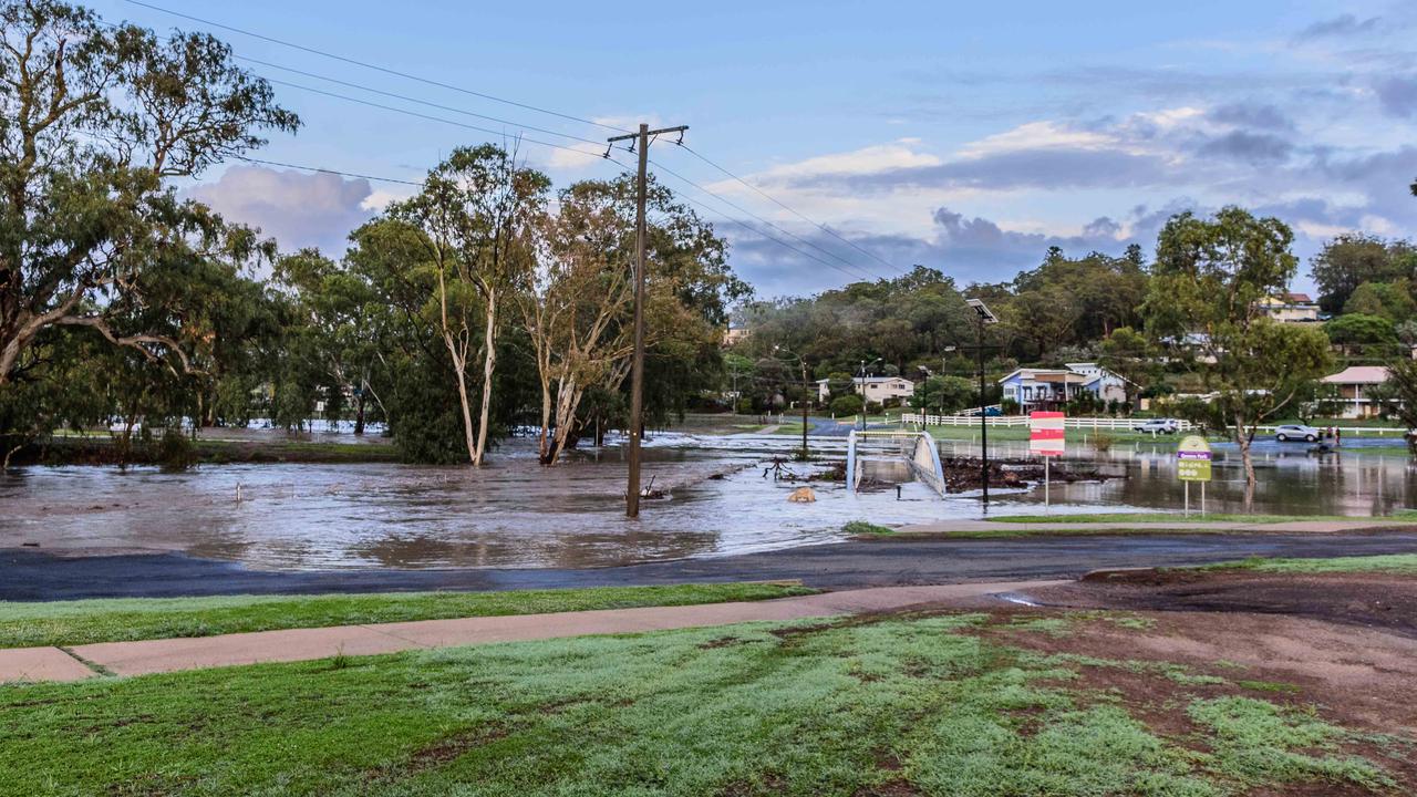 DELUGE: The Condamine River in Warwick overflowed and washed out the roads surrounding Queens Park.