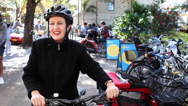 Sydney Lord Mayor Clover Moore riding a bike.