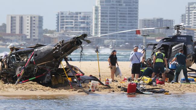 The two helicopters on a sand bank on the Broadwater, near Sea World. Picture: News Media Network