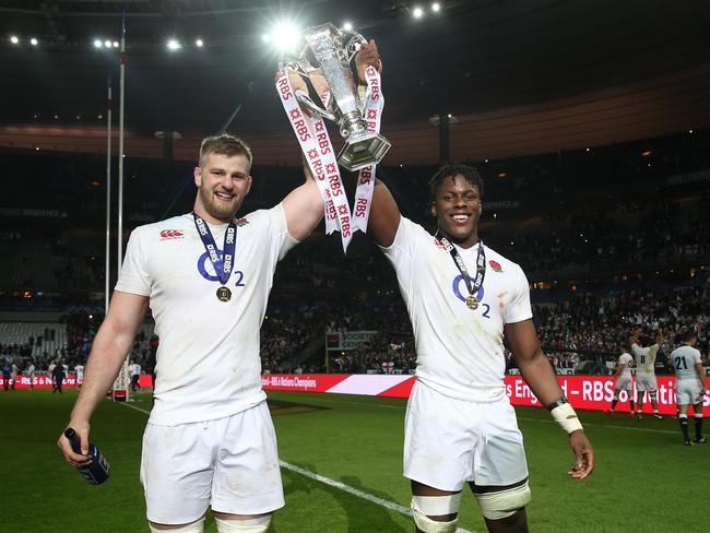 PARIS, FRANCE - MARCH 19: England locks George Kruis celebrates with Maro Itoje after their victory during the RBS Six Nations match between France and England at Stade de France on March 19, 2016 in Paris, France. (Photo by David Rogers - RFU/The RFU Collection via Getty Images)