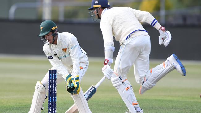 Tim Paine of the Tigers looks for a runout during day three of the Sheffield Shield match between Tasmania and New South Wales. (Photo by Steve Bell/Getty Images)