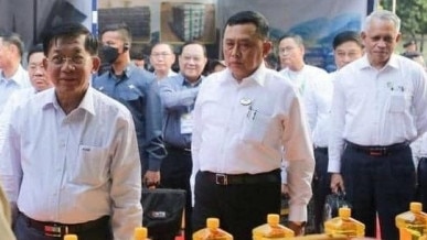 Attempted coup leader Min Aung Hlaing, left, along with his appointed ministers Aung Zaw Aye and Aung Naing Oo attending a mining exhibition in Shan State in 2023 where Cornerstone is an exhibitor. Picture: Facebook