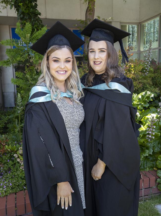 Madi Walsh and Simone Mace at the UTAS Graduation at Burnie. PICTURE CHRIS KIDD