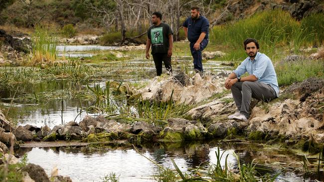 Tyson Lovett-Murray, Christopher Saunders and Aaron Morgan at Lake Condah. Picture: Stuart McEvoy