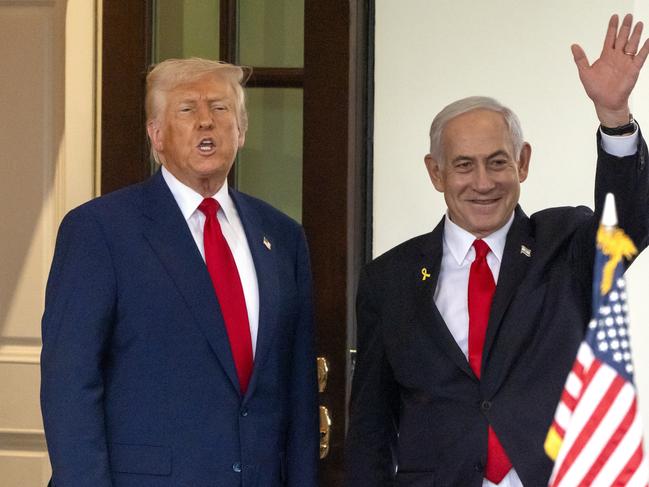 President Donald Trump, left, speaks as Israel's Prime Minister Benjamin Netanyahu waves up leaving the West Wing of the White House, Monday, April 7, 2025, in Washington. (AP Photo/Mark Schiefelbein)