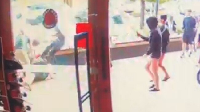 <span capiid="df7c29b4070a0fd63b4f14b0cdc90084" class="captionCapiVideo">CCTV captures the moment Coolangatta Lines Skate Store owner Les Graue was allegedly bashed by teens.</span> Picture: Supplied