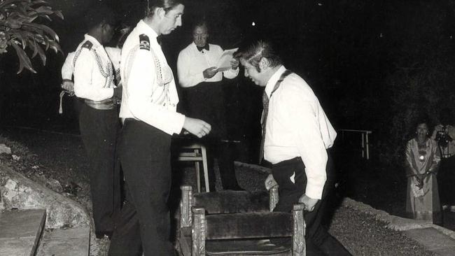 John Yocklunn receives his first knighthood from Prince Charles in 1975