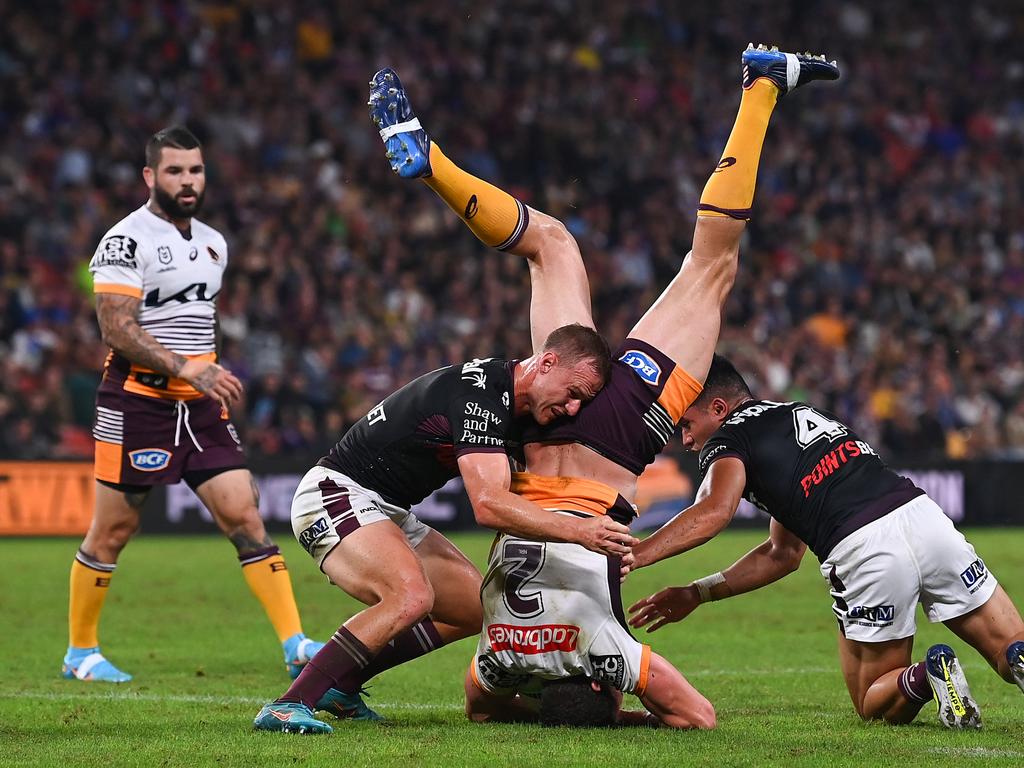 Corey Oates of the Broncos is tackled during the round 10 NRL match between the Manly Sea Eagles and the Brisbane Broncos. Picture: Bradley Kanaris/Getty Images